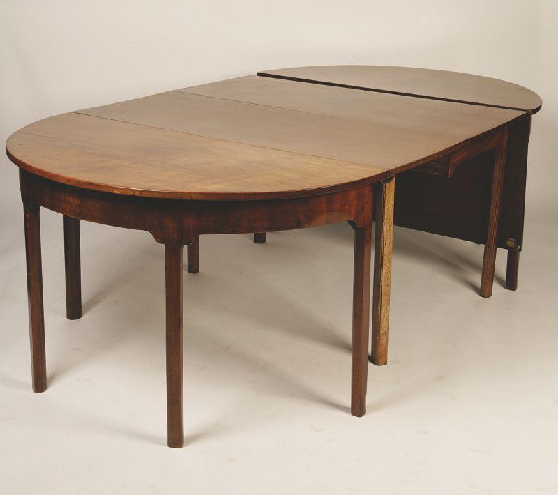 Appraisal: A GEORGE III MAHOGANY D -END DINING TABLE with a