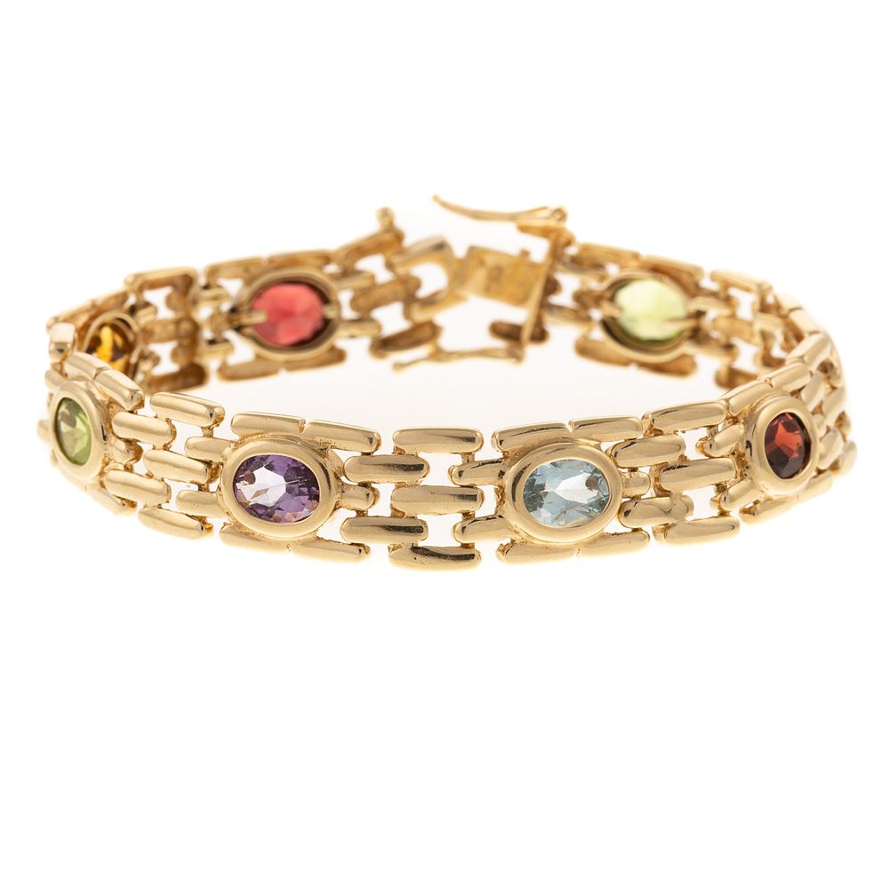 Appraisal: A Multi-Gemstone Panther Link Bracelet in K K yellow gold