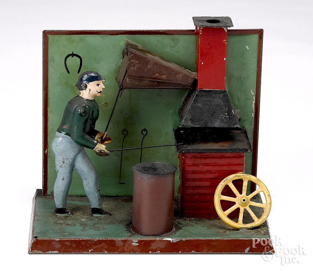 Appraisal: Becker wheelwright shop steam toy accessory Becker painted tin wheelwright