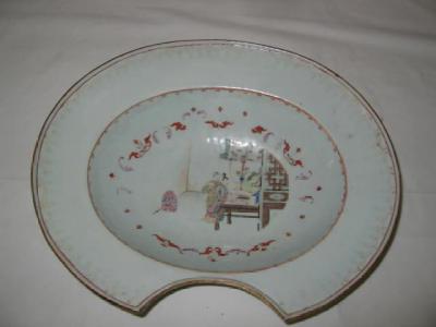 Appraisal: A FAMILLE ROSE PORCELAIN BARBER'S BOWL painted with a figure