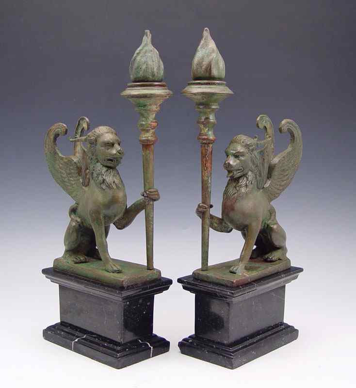 Appraisal: PAIR BRONZE AND MARBLE GRIFFIN BOOKENDS Patinated bronze griffins holding