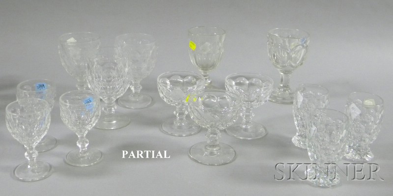 Appraisal: Forty-seven Pieces Colorless Thumbprint Pattern Stemware including nine small glasses