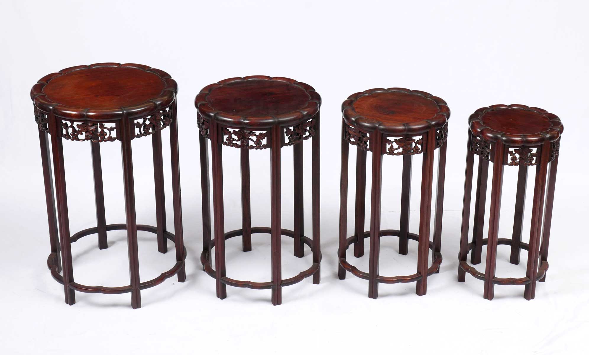 Appraisal: PC JAPANESE NESTING TABLES Japanese carved nesting tables having a