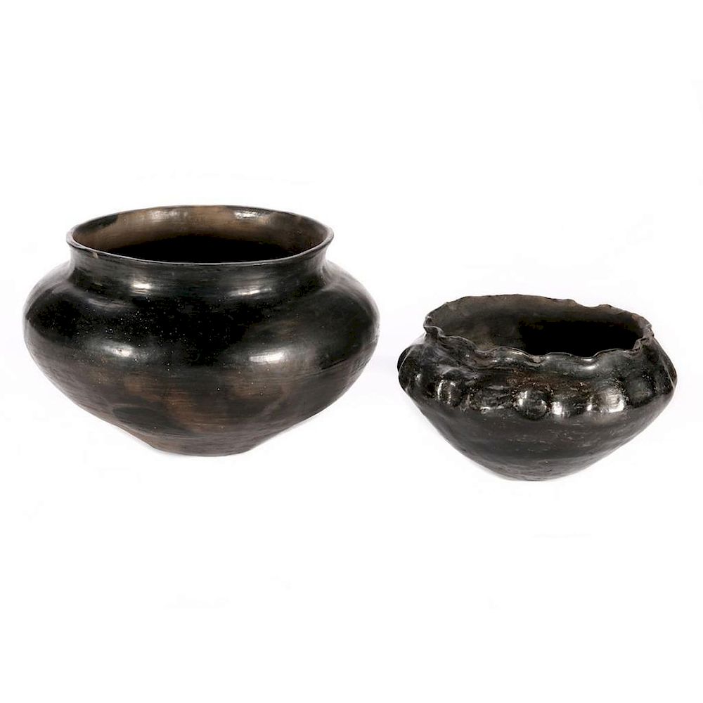 Appraisal: Two Santa Clara Blackware Jars Early th century examples Diameter