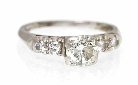 Appraisal: A Platinum and Diamond Ring containing one round transitional brilliant