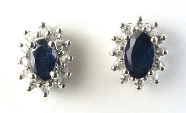 Appraisal: PAIR OF SAPPHIRE AND DIAMOND EAR STUDS Each k white