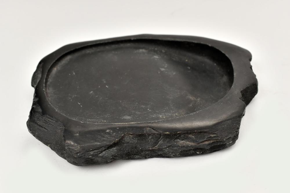 Appraisal: CHINESE INKSTONEProbably th Century The black stone with an oval