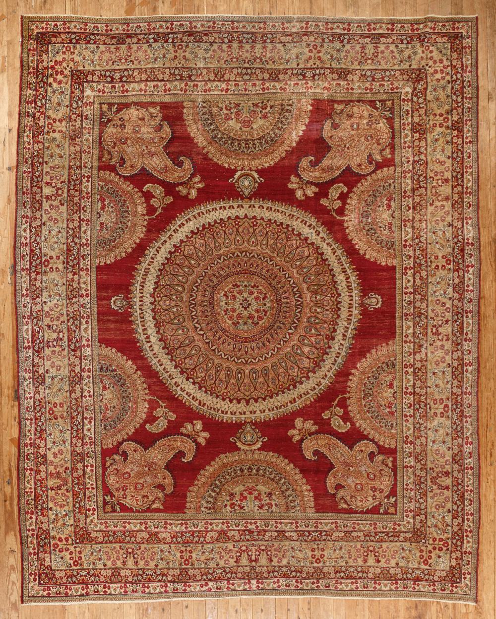 Appraisal: Antique Persian Carpet red ground circular medallion ft in x