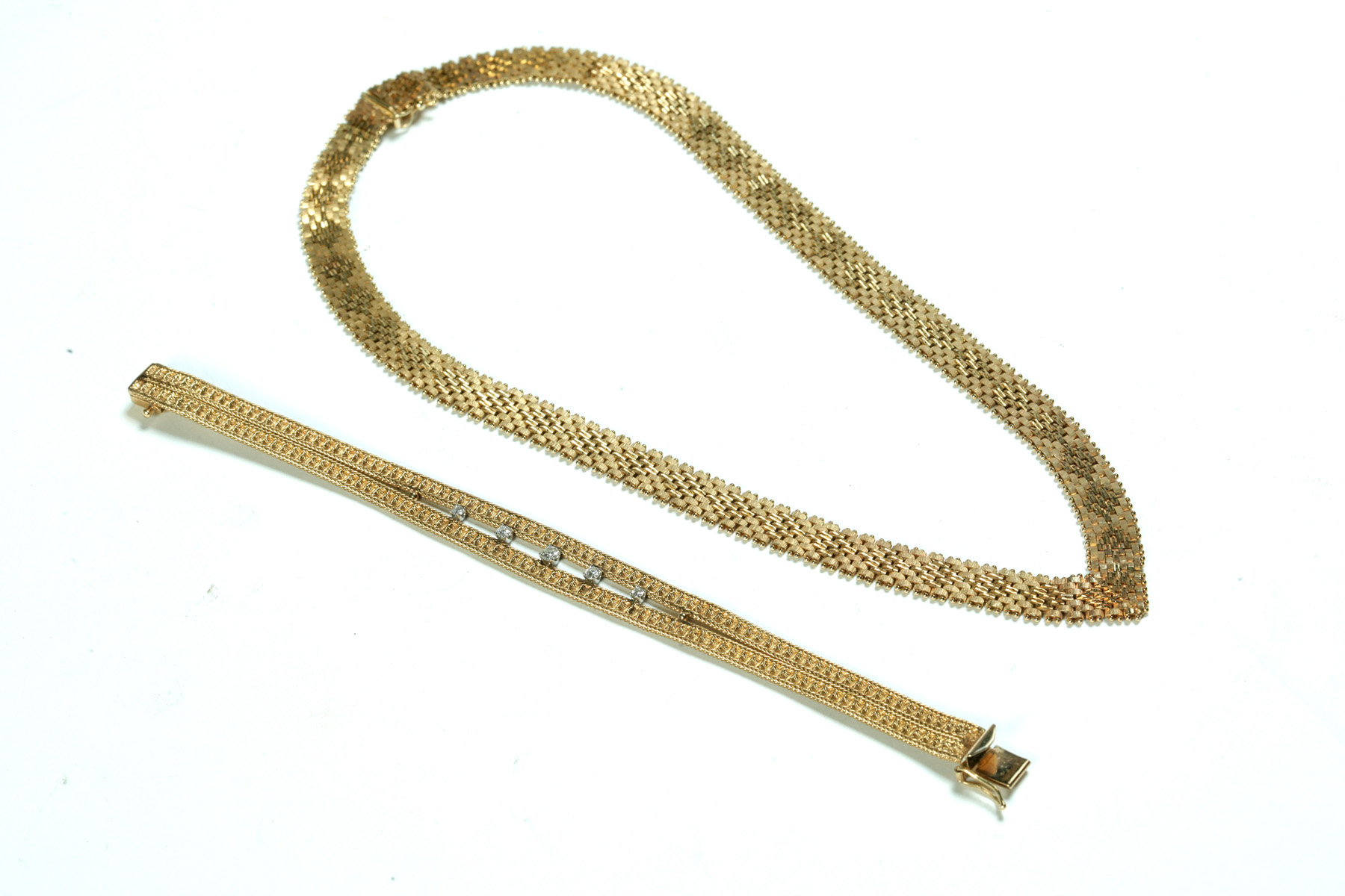 Appraisal: GOLD MESH BRACELET AND NECKLACE American th century k yellow