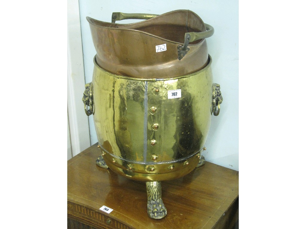 Appraisal: Lot comprising copper coal helmet and a brass coal bin