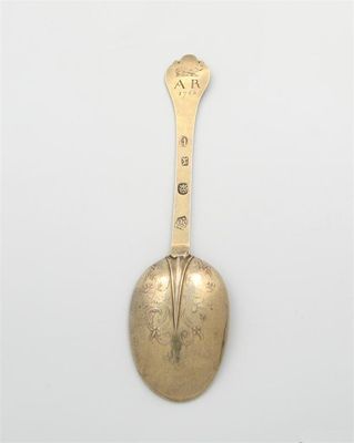 Appraisal: A William and Mary silver-gilt lace-back trefid spoon by Stephen