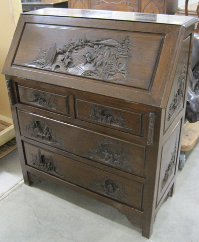 Appraisal: CARVED TEAKWOOD SLANT-TOP DESK Chinese th century the slant top