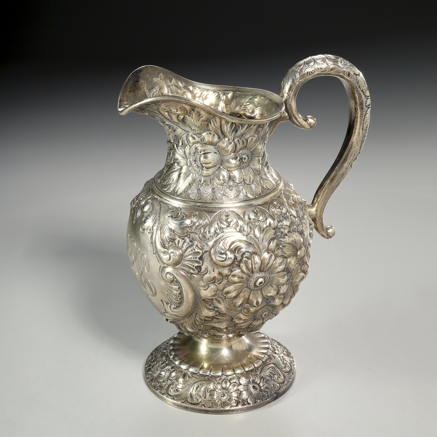 Appraisal: M F HAMILTON SON REPOUSSE STERLING PITCHER c American footed