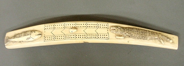 Appraisal: - Inuit scrimshaw walrus tusk cribbage board th c with