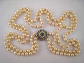 Appraisal: A two row cultured pearl necklace approx cm long pearls