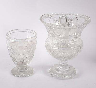 Appraisal: A heavy cut glass thistle-shaped vase on a circular base