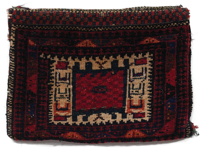 Appraisal: Baluchi bag c geometric design on a red field some