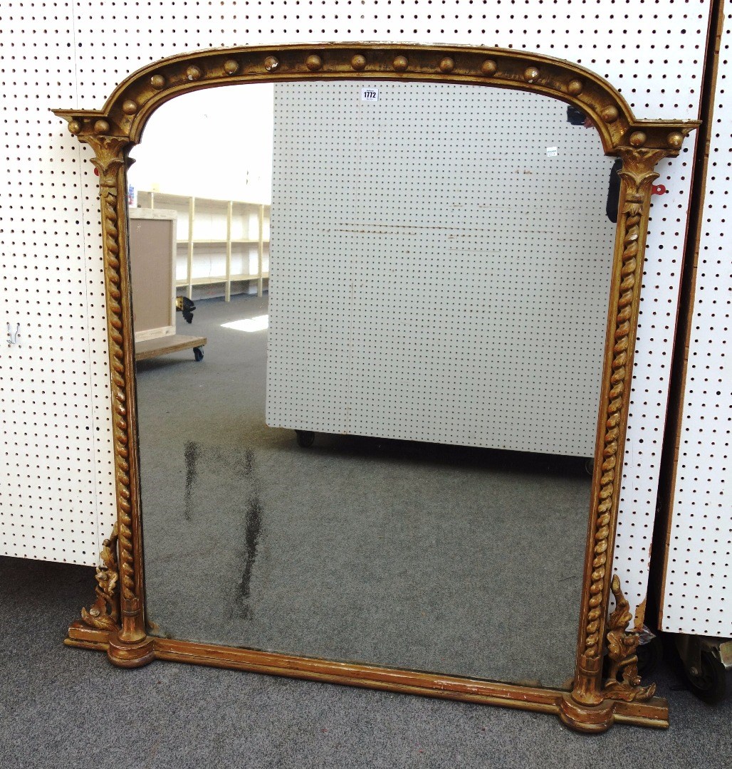 Appraisal: A Victorian gilt framed over mantel mirror with ball mounted