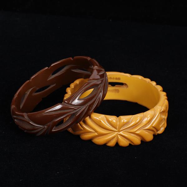 Appraisal: Two pierce carved bakelite bangle bracelets