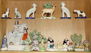 Appraisal: Two shelves of Staffordshire figural groups including some pearlware examples