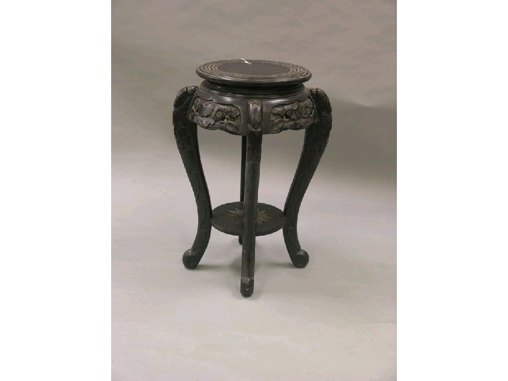 Appraisal: A late th century Japanese carved wood jardiniere stand circular