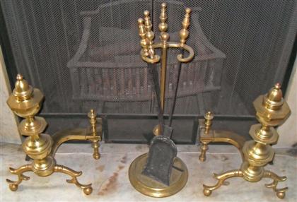 Appraisal: Pair of brass andirons with urn finials and spurred kneesTogether