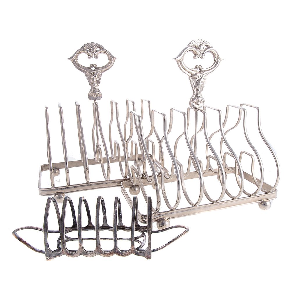 Appraisal: Three English Silver Plated Toast Racks Including a large pair