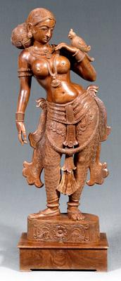 Appraisal: Indian wood sculpture of a yakshi finely carved in a