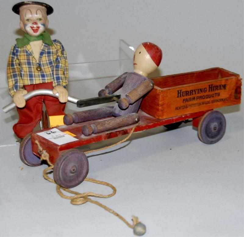 Appraisal: Lot of Two Toys Includes one wooden toy on cart