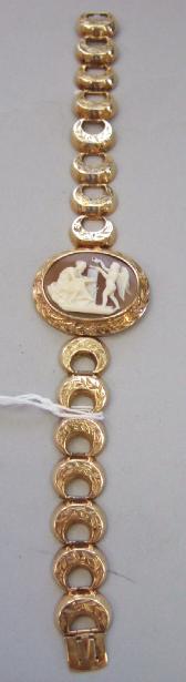 Appraisal: A Victorian gold and shell cameo bracelet the central oval