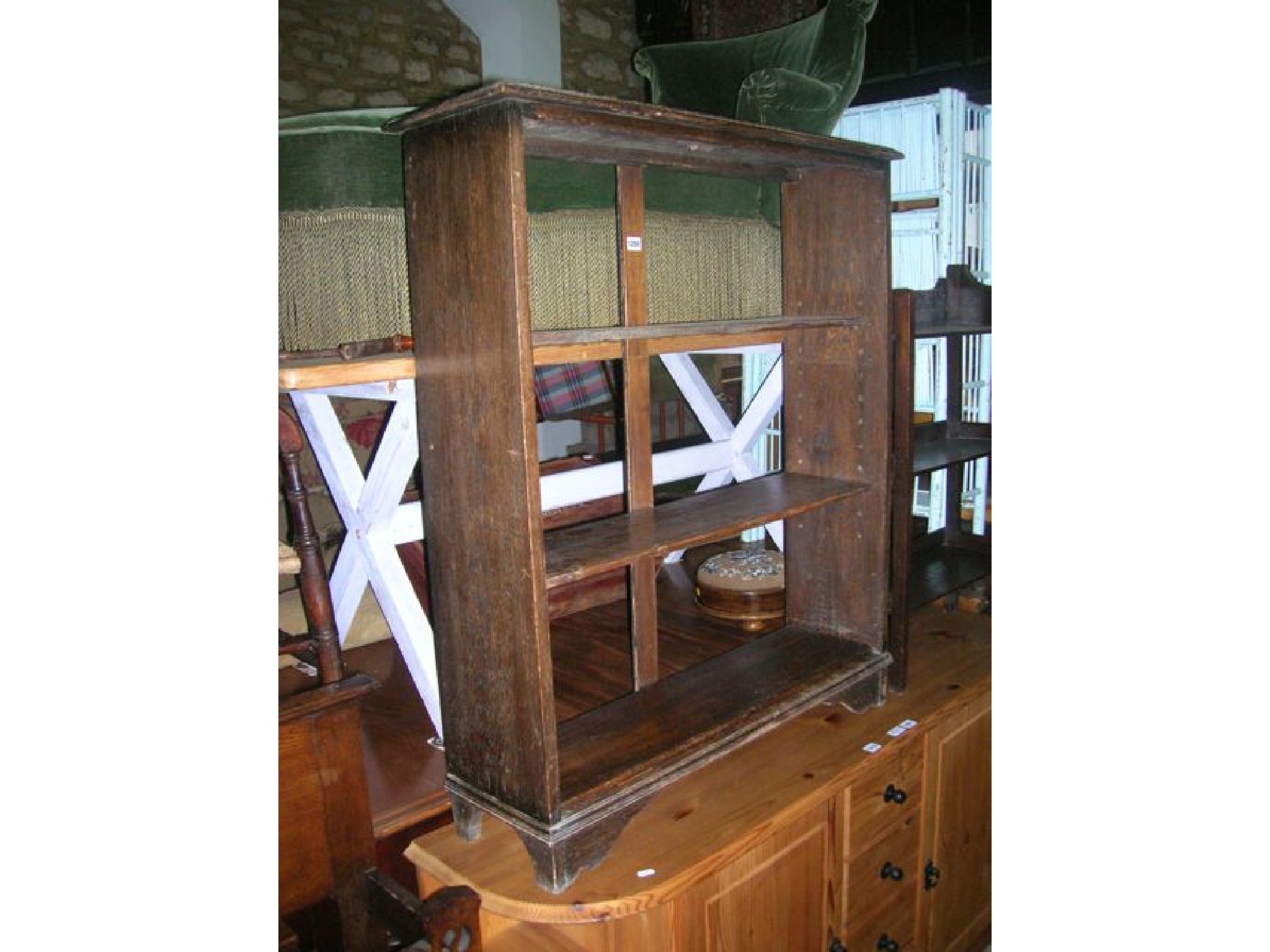 Appraisal: A small oak three tier freestanding bookcase in the Arts