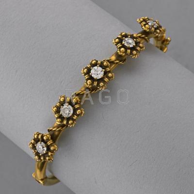 Appraisal: VICTORIAN STYLE K GOLD DIAMOND BANGLE ca Victorian floral motif