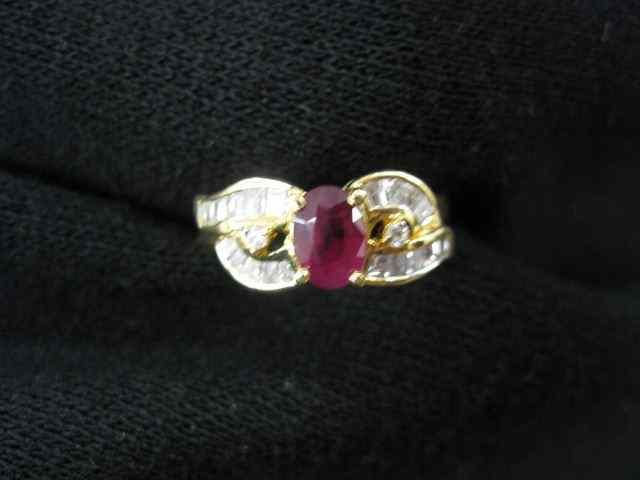 Appraisal: Ruby Diamond Ring oval ruby weighing carat surrounded by round