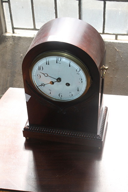 Appraisal: A TH CENTURY MAHOGANY MANTEL CLOCK with white enamel dial