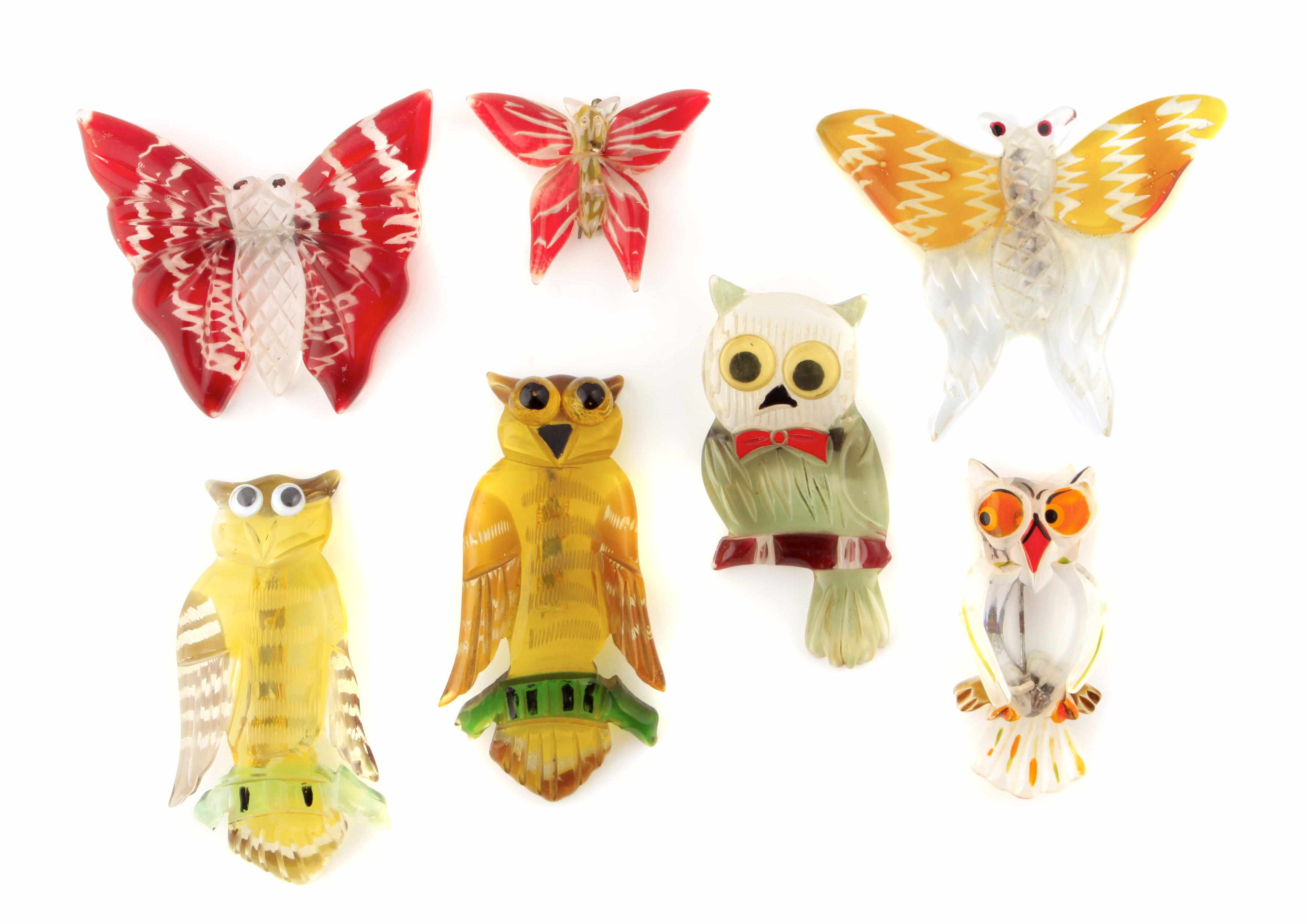 Appraisal: Seven Lucite brooches three butterflies and four owls