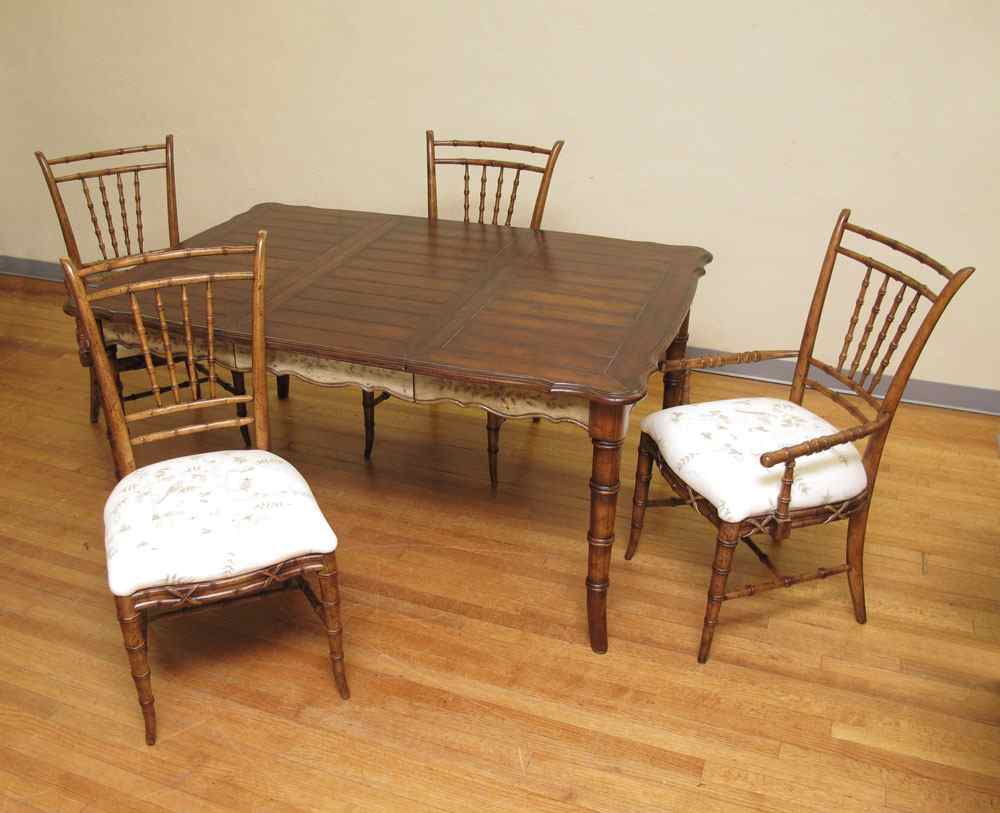 Appraisal: DINING TABLE AND BAMBOO TYPE CHAIRS Faux paneled top table