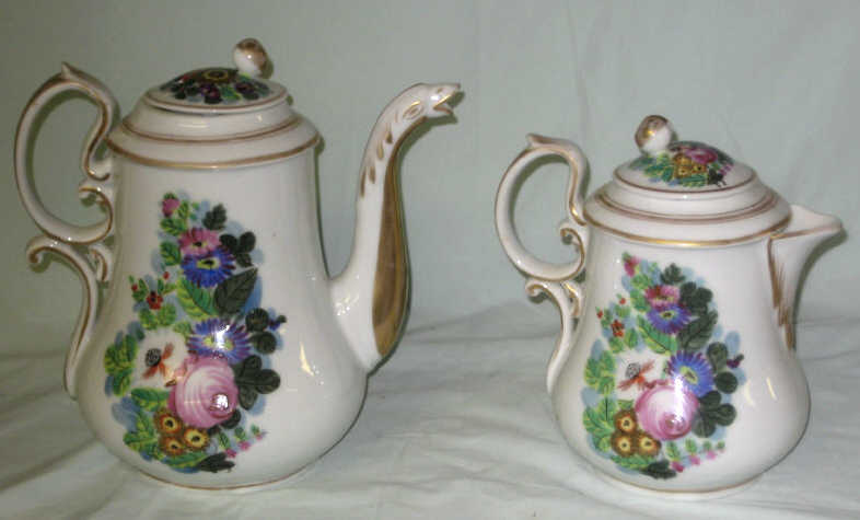 Appraisal: TWO OLD PARIS PORCELAIN POTS A coffee pot with beak