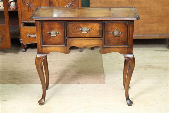 Appraisal: SMALL SERVER Mahogany with a burlwood veneered top and three