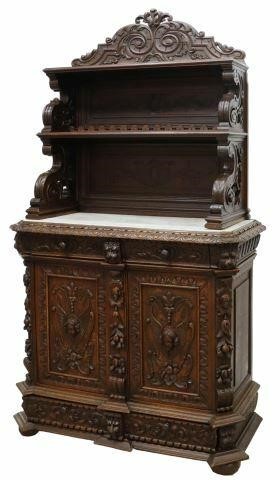 Appraisal: French carved oak sideboard th c crest over paneled back