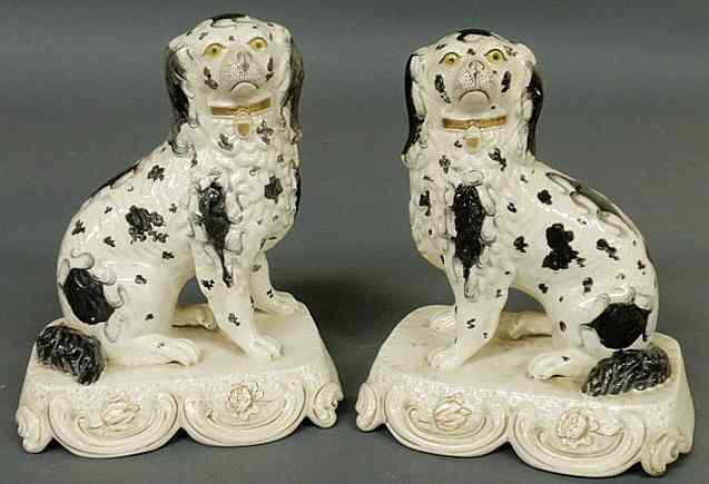 Appraisal: Fine pair of th c Staffordshire seated black and white