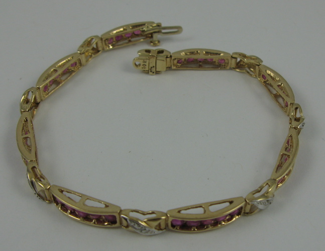 Appraisal: RUBY DIAMOND AND K GOLD BRACELET in length and set