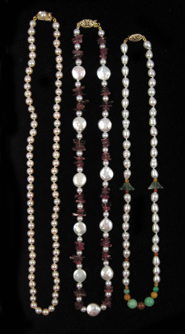 Appraisal: THREE PEARL AND FOURTEEN KARAT GOLD NECKLACES including a inch