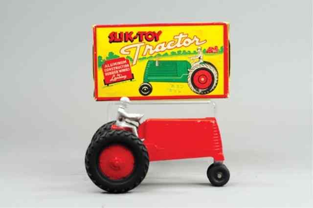 Appraisal: SLIK TOY BOXED TRACTOR Another Old Store Stock aluminum tractor