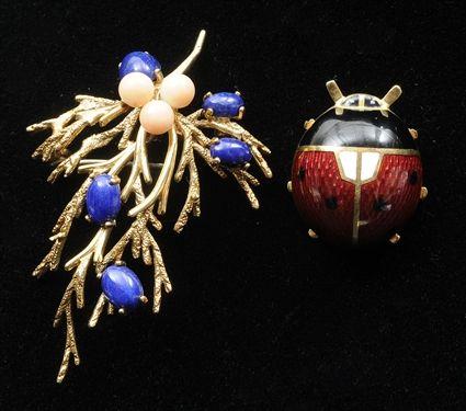 Appraisal: Two Small Brooches The enameled bug stamped in the branch