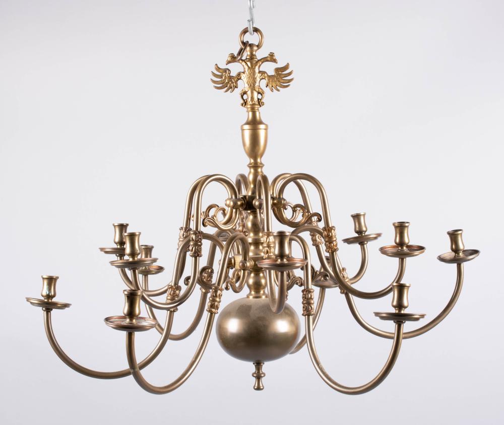 Appraisal: BAROQUE STYLE TWO-LIGHT BRASS CHANDELIER the central baluster support issuing