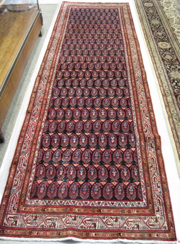 Appraisal: PERSIAN MIR HALL CARPET Arak region northwestern Iran repeating rows