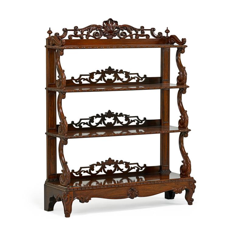 Appraisal: VICTORIAN ETAGERE Rosewood with hand carved designs mid late th