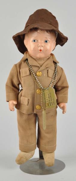 Appraisal: Small Doll in Army Uniform This small composition head doll