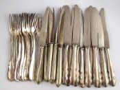 Appraisal: A set of twelve silver dessert forks and silver handled