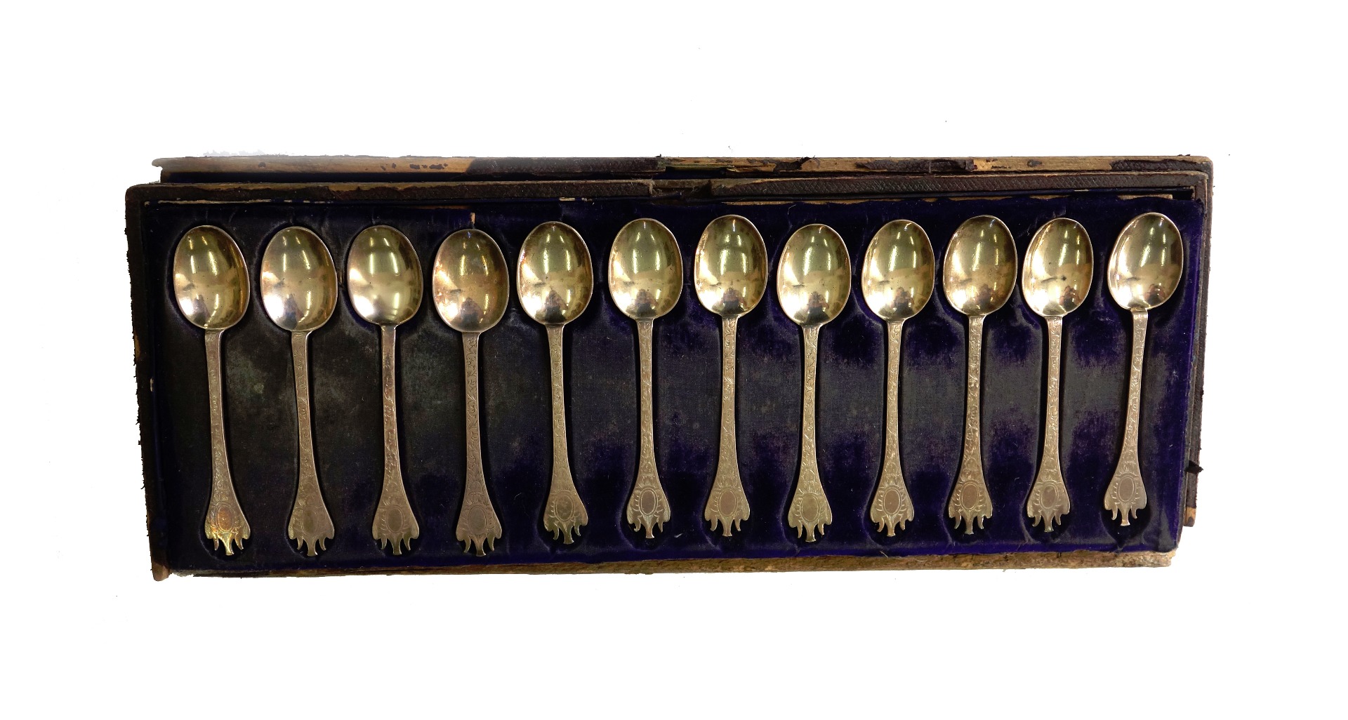 Appraisal: A cased set of twelve Victorian silver engraved trefid end